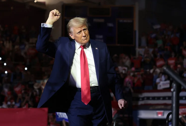 GREENVILLE, NORTH CAROLINA - OCTOBER 21: Republican presidential nominee, former U.S. President Donald Trump leaves the stage following a campaign rally at Williams Arena at Minges Coliseum on October 21, 2024 in Greenville, North Carolina. Trump is campaigning throughout North Carolina today as he and Democratic presidential nominee, U.S. Vice President Kamala Harris continue to campaign in battleground swing states ahead of the November 5th election.   Win McNamee/Getty Images/AFP (Photo by WIN MCNAMEE / GETTY IMAGES NORTH AMERICA / Getty Images via AFP)