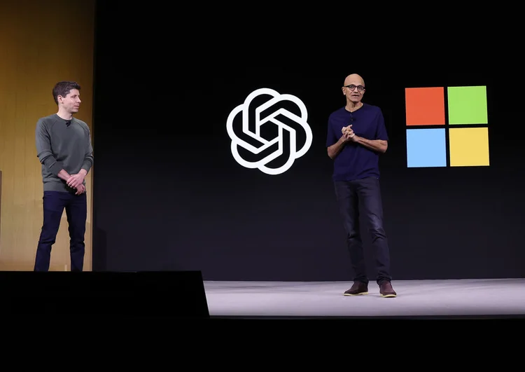 SAN FRANCISCO, CALIFORNIA - NOVEMBER 06: Microsoft CEO Satya Nadella (R) speaks as OpenAI CEO Sam Altman (L) looks on during the OpenAI DevDay event on November 06, 2023 in San Francisco, California. Altman delivered the keynote address at the first ever Open AI DevDay conference. (Photo by Justin Sullivan/Getty Images) (Justin Sullivan/Getty Images)