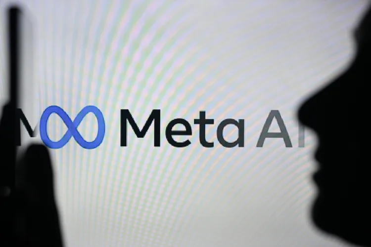 EDMONTON, CANADA - APRIL 28:
An image of a woman holding a cell phone in front of the Meta AI logo displayed on a computer screen, on April 29, 2024, in Edmonton, Canada. (Photo by Artur Widak/NurPhoto via Getty Images)