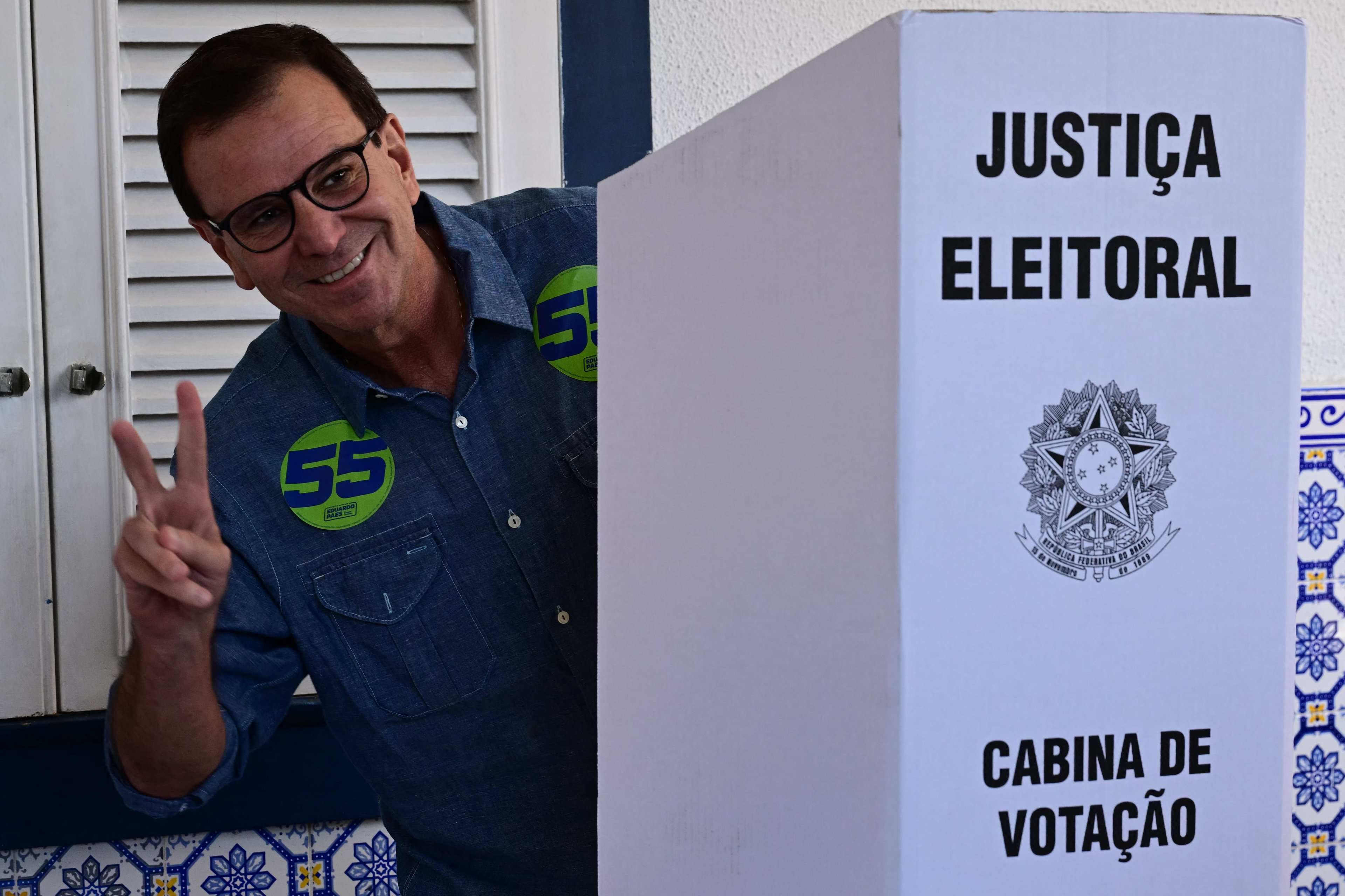 Rio de Janeiro city mayor and candidate for re-election Eduardo Paes, of the Social Democratico party (PSD) casts his vote during the municipal elections first round, in Rio de Janeiro, Brazil, on October 6, 2024. Brazilians go to the polls Sunday to elect mayors and councillors in more than 5,500 cities after a vitriolic, sometimes violent campaign two years after presidential elections that polarized Latin America's biggest country. (Photo by PABLO PORCIUNCULA / AFP) (Photo by PABLO PORCIUNCULA/AFP via Getty Images)