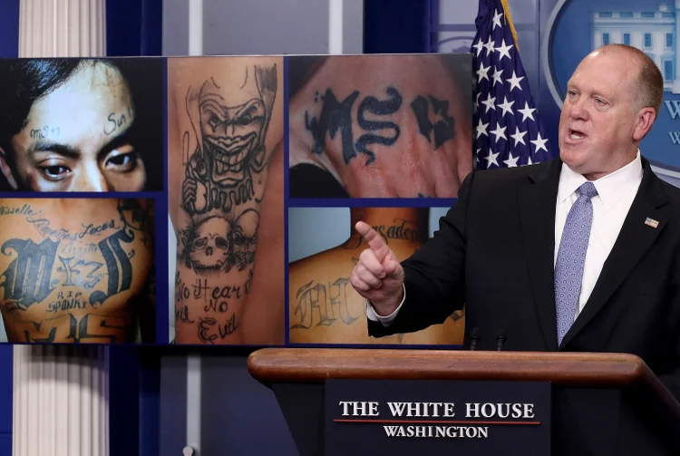 (FILES) Tom Homan, Director of Immigration and Customs Enforcement, answers questions in front of gang related photos from the MS-13 gang during a daily briefing at the White House July 27, 2017 in Washington, DC. President-elect Donald Trump said late on November 10, 2024 that he was bringing back hardline immigration official Tom Homan to oversee the country's borders in the incoming administration. (Photo by WIN MCNAMEE / GETTY IMAGES NORTH AMERICA / AFP)