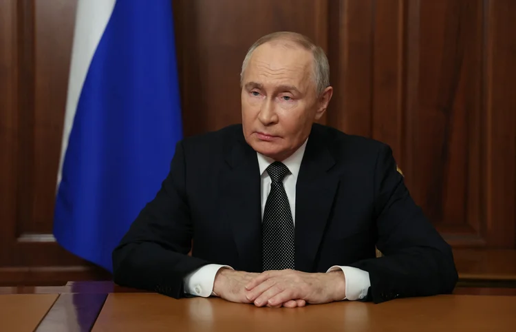 O presidente russo, Vladimir Putin, durante discurso na TV nesta quinta, 21 (Sputnik/AFP)