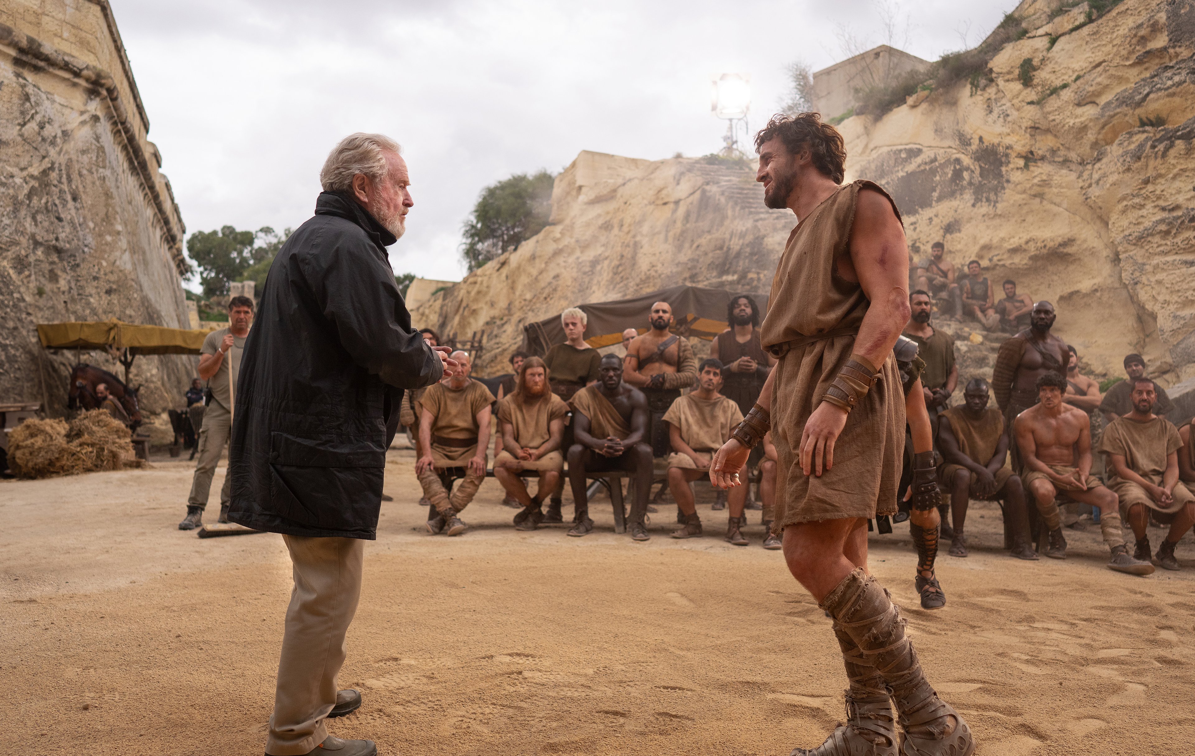 Director Ridley Scott and Paul Mescal on the set of Gladiator II from Paramount Pictures.