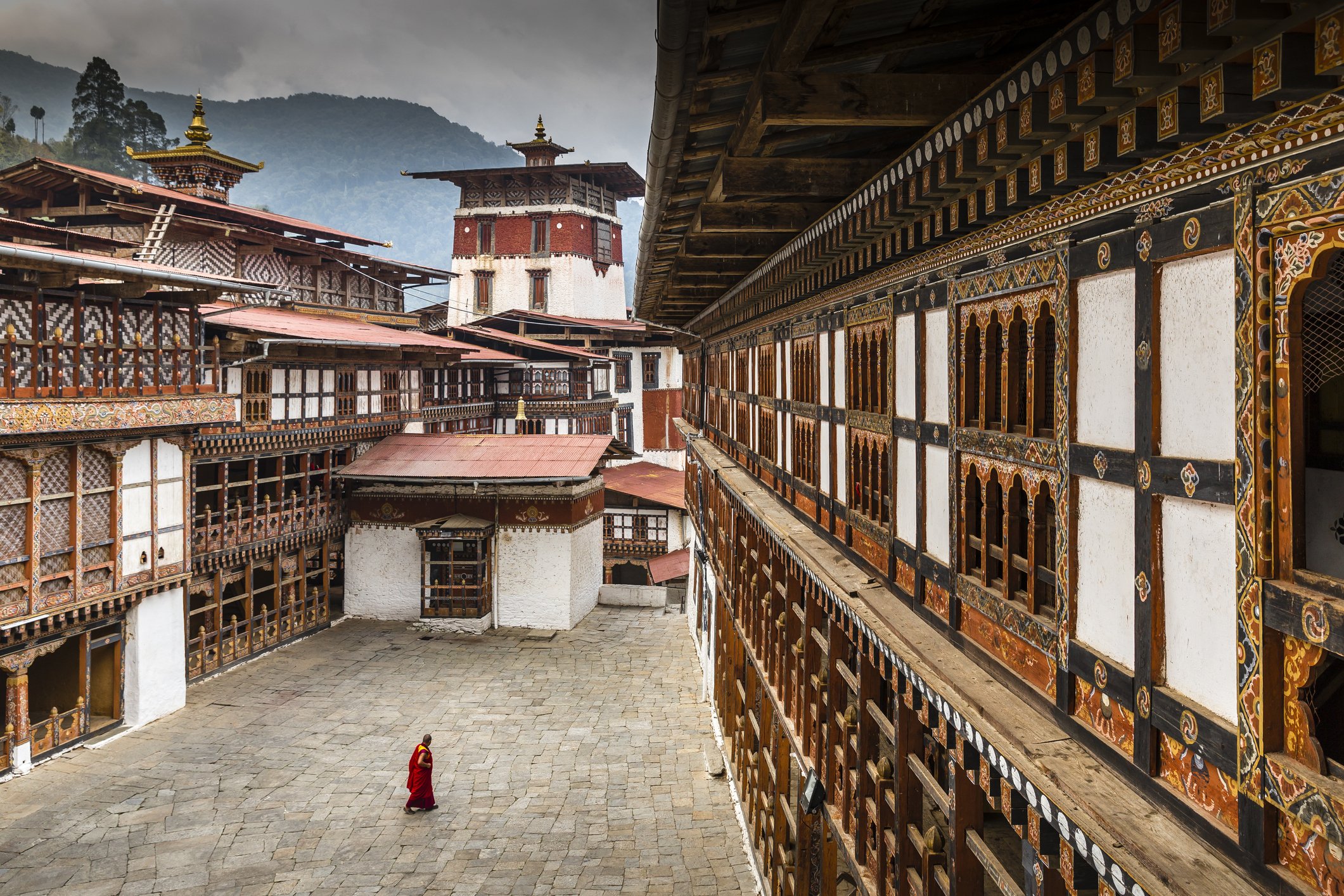 Monk in courtyard of Trongsa Dzong