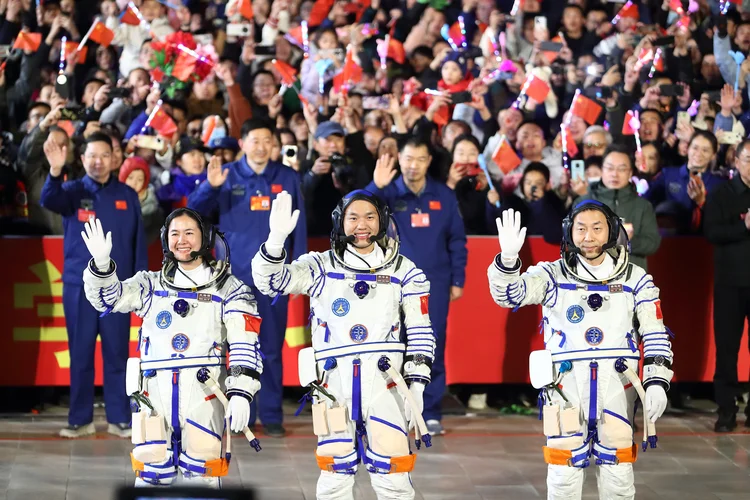 ALXA, CHINA - OCTOBER 30: (L-R) Chinese astronauts Wang Haoze, Song Lingdong and Cai Xuzhe of the Shenzhou-19 crewed space mission attend a see-off ceremony at the Jiuquan Satellite Launch Center on October 30, 2024 in Alxa League, Inner Mongolia Autonomous Region of China. A see-off ceremony for three Chinese astronauts of the Shenzhou-19 crewed space mission was held on October 30. (Photo by VCG/VCG via Getty Images) (VCG/VCG /Getty Images)