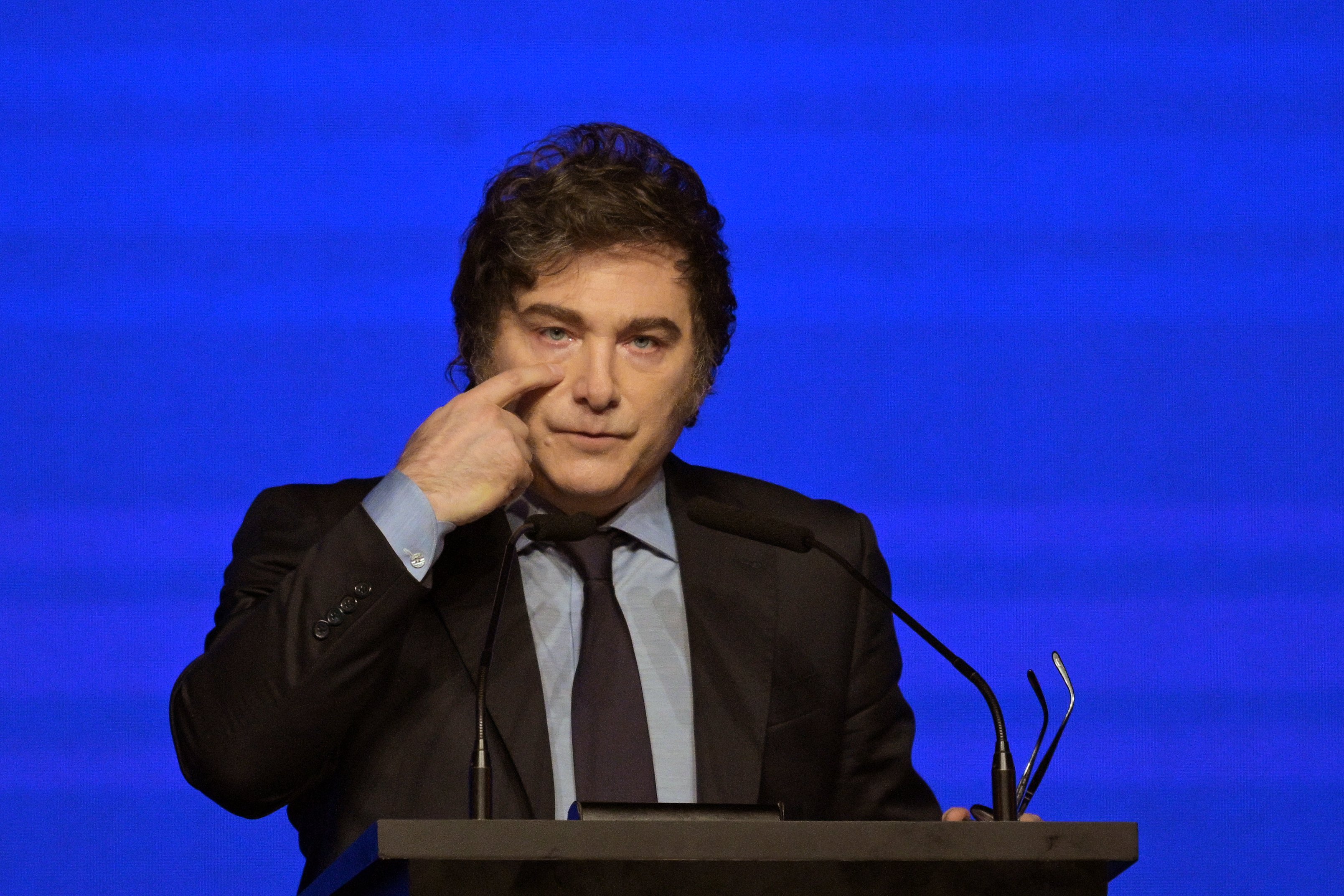 Argentina's President Javier Milei gestures during the Conservative Political Action Conference (CPAC) in Buenos Aires on December 4, 2024. (Photo by JUAN MABROMATA / AFP)