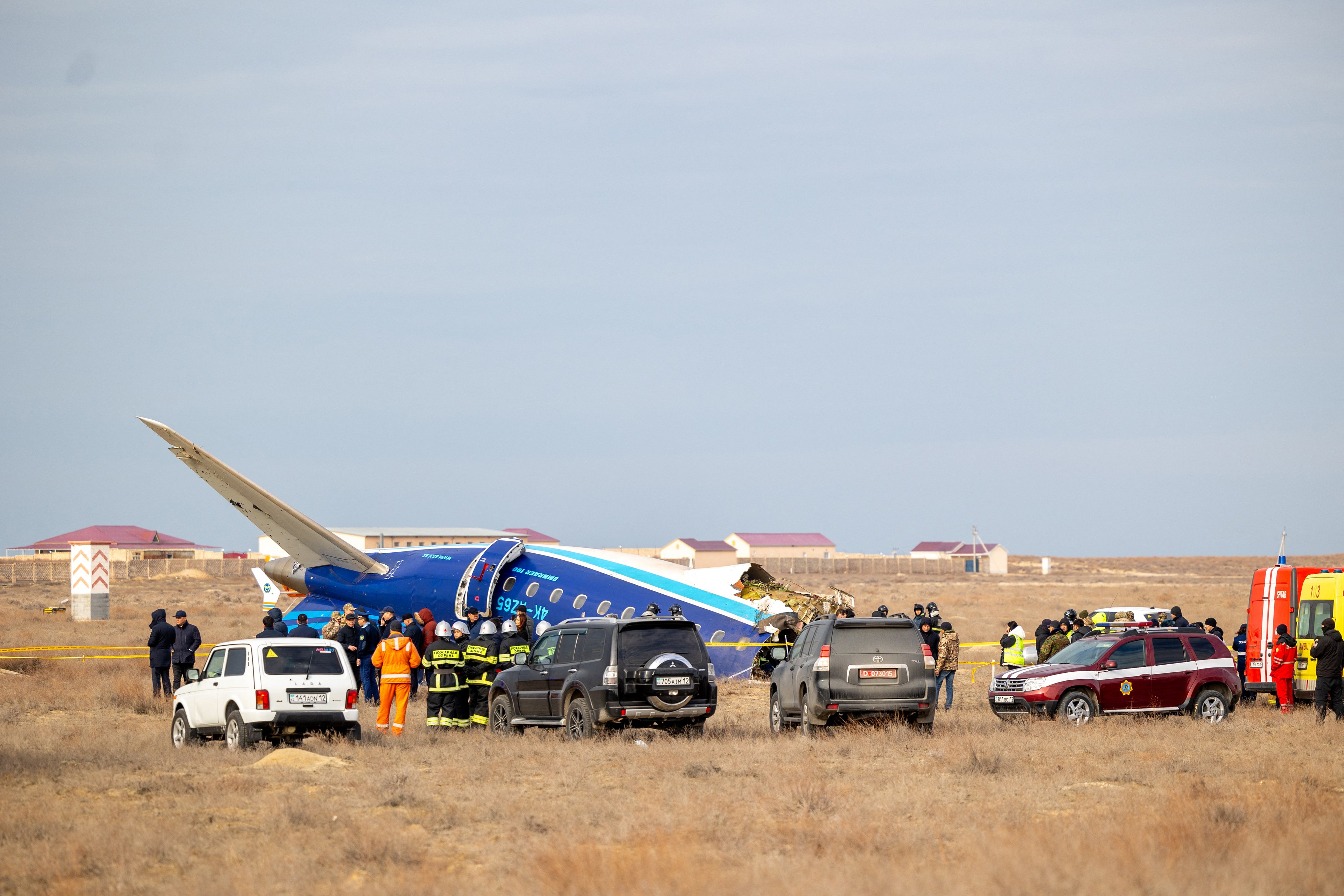 Emergency specialists work at the crash site of an Azerbaijan Airlines passenger jet near the western Kazakh city of Aktau on December 25, 2024. (Photo by Kamilla Jumayeva / AFP) / The erroneous mention[s] appearing in the byline of this photo 36RH2EQ has been modified in AFP systems in the following manner: [Kamilla Jumayeva] instead of [Issa Tazhenbayev]. Please immediately remove the erroneous mention[s] from all your online services and delete it (them) from your servers. If you have been authorized by AFP to distribute it (them) to third parties, please ensure that the same actions are carried out by them. Failure to promptly comply with these instructions will entail liability on your part for any continued or post notification usage. Therefore we thank you very much for all your attention and prompt action. We are sorry for the inconvenience this notification may cause and remain at your disposal for any further information you may require.