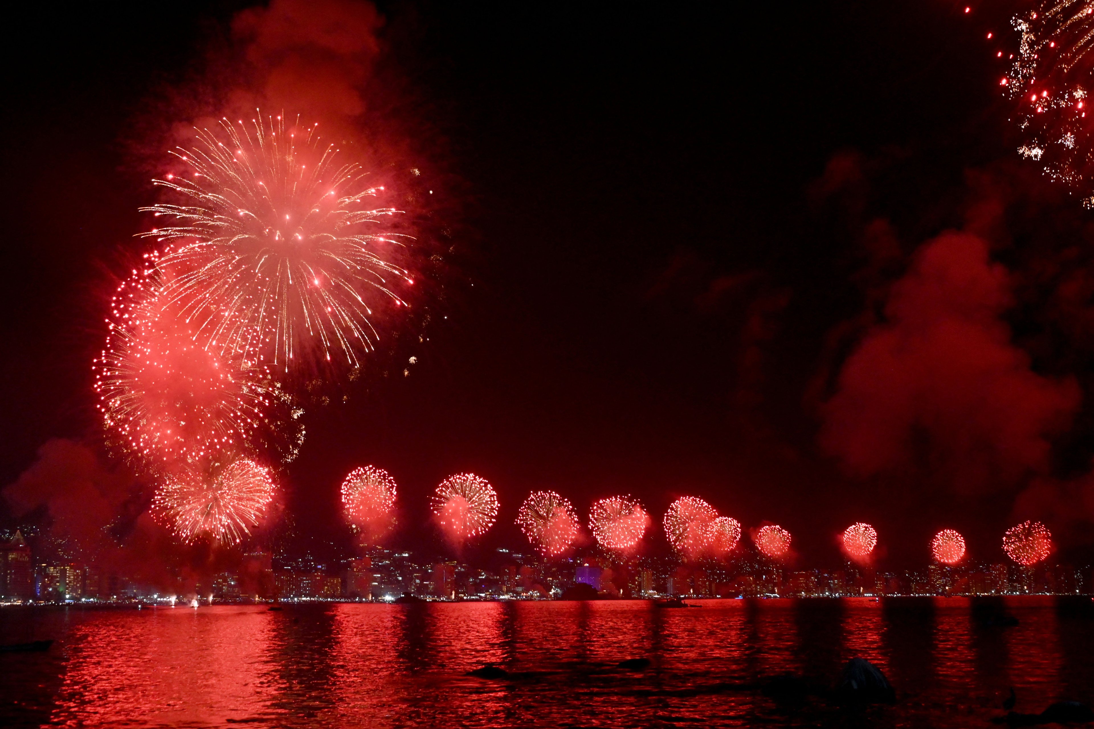 Fireworks go off at the Acapulco Bay during New Year's Eve celebrations in Acapulco, Guerrero State, on January 1, 2025. (Photo by  / AFP)