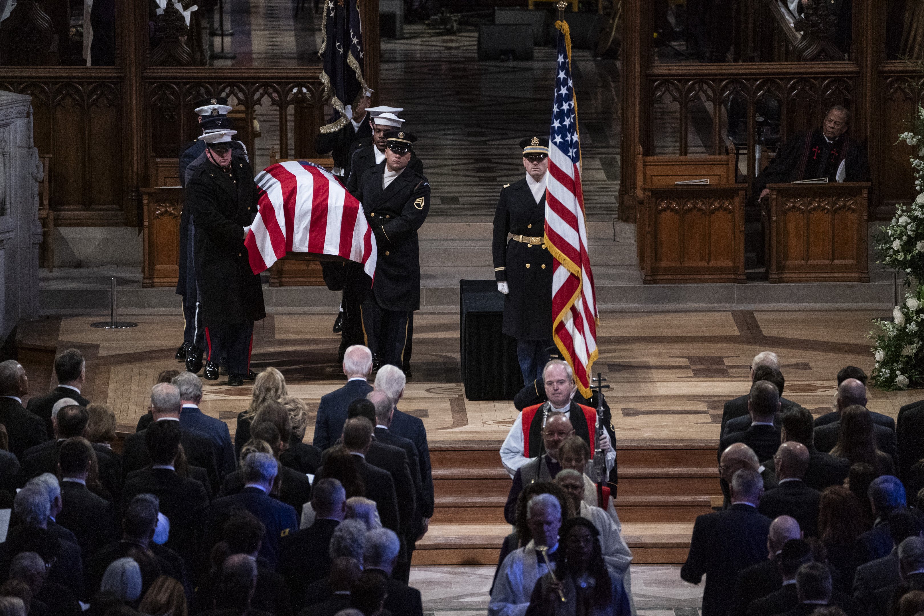 The casket of former US President Jimmy Carter is carried out of the National Cathedral in Washington, DC, after his state funeral on January 9, 2025. (Photo by Haiyun Jiang / POOL / AFP)