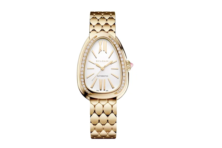 Serpenti Seduttori Automatic 103898: Caixa e bisel em ouro amarelo de 34 mm cravejados com 36 diamantes redondos de lapidação brilhante (0,6 quilates). Coroa de ouro amarelo cravejada com rubelita rosa em lapidação cabochão (Bvlgari/Divulgação)