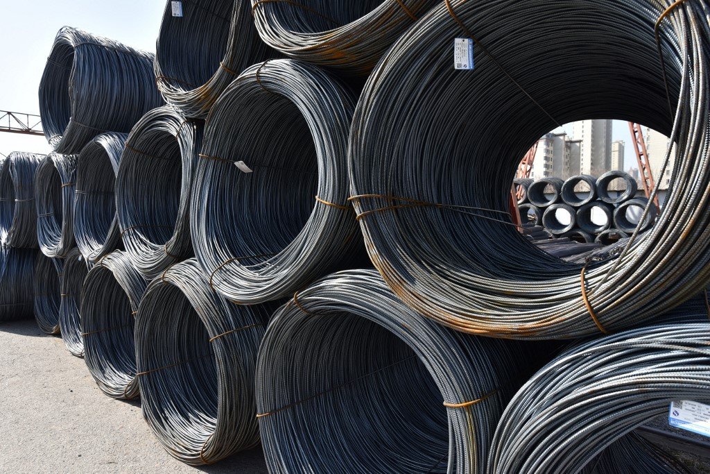Rolls of steel are seen at a steel market in Fuyang, in Chinas eastern Anhui province on February 10, 2025. (Photo by AFP) / China OUT