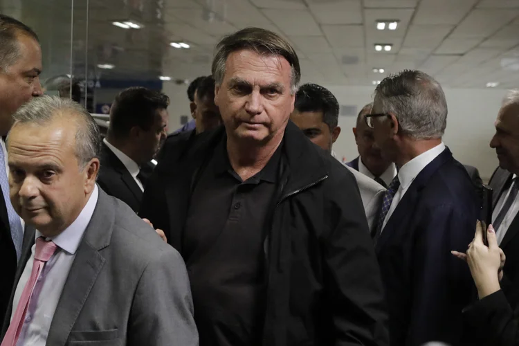 Former Brazil's President Jair Bolsonaro (C) arrives at the Federal Senate to have lunch with leaders of opposition parties in Brasilia on February 18, 2025. (Photo by Sergio Lima / AFP) (Sergio Lima / AFP)