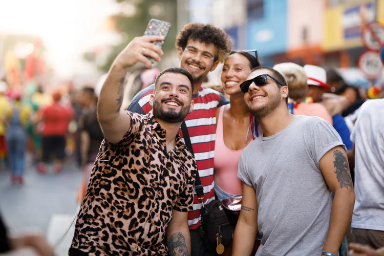 Brazilian Carnival. Group of friends celebrating street carnival party. (Getty Images)