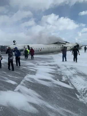 Avião da Delta se acidenta e 'capota' durante pouso em Toronto