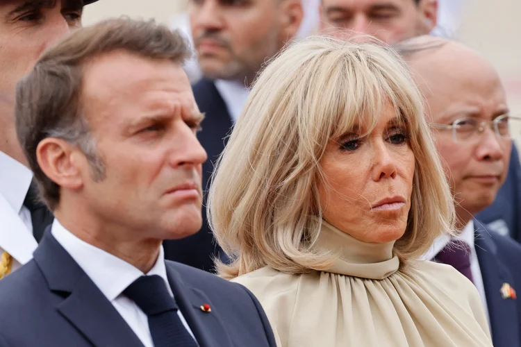 O presidente da França, Emmanuel Macron, com a mulher, Brigitte, durante viagem ao Vietnã (Ludovic Marin/AFP)