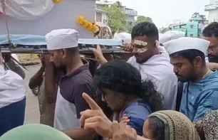 Imagem referente à matéria: Único sobrevivente de acidente da Air India carrega caixão de irmão morto na tragédia; vídeo