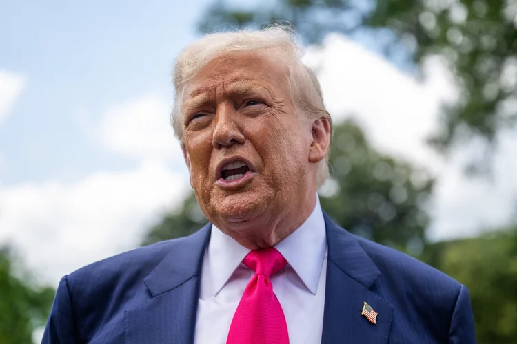 US President Donald Trump speaks to reporters on his way to board Marine One on the South Lawn of the White House on July 15, 2025, in Washington, DC. Trump is travelling to Pittsburgh, Pennsylvania, to speak at the Pennsylvania Energy and Innovation Summit on the campus of Carnegie Mellon University. (Photo by Jim WATSON / AFP)