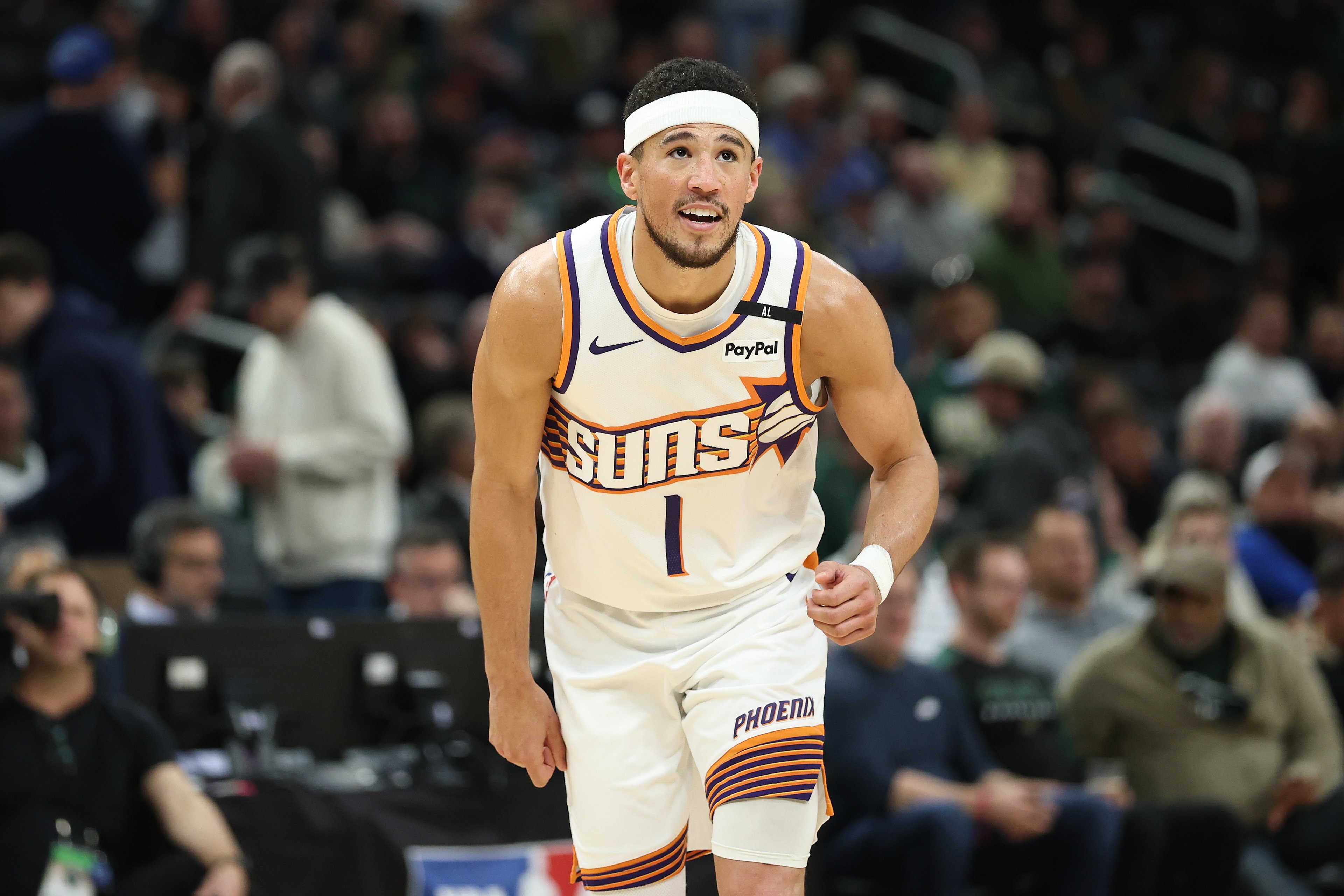 MILWAUKEE, WISCONSIN - APRIL 01: Devin Booker #1 of the Phoenix Suns waits for a free throw during a game against the Milwaukee Bucks at Fiserv Forum on April 01, 2025 in Milwaukee, Wisconsin. NOTE TO USER: User expressly acknowledges and agrees that, by downloading and or using this photograph, User is consenting to the terms and conditions of the Getty Images License Agreement. (Photo by Stacy Revere/Getty Images)