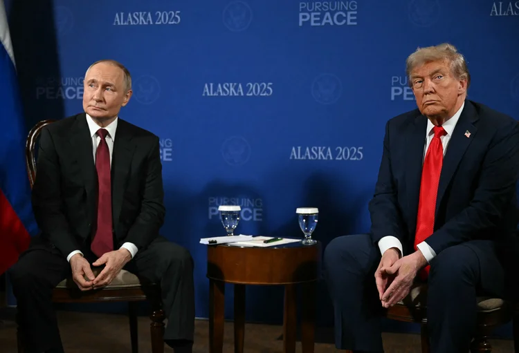 US President Donald Trump and Russian President Vladimir Putin meet during a US-Russia summit on Ukraine at Joint Base Elmendorf-Richardson in Anchorage, Alaska, on August 15, 2025. (Photo by ANDREW CABALLERO-REYNOLDS / AFP)