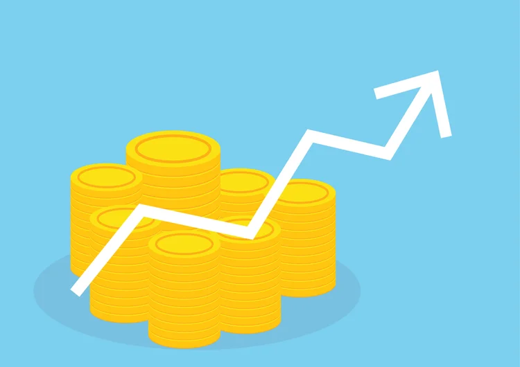 Moeda de ouro com gráfico. Conceito de investimento.
 (Wipas_Rojjanakard/Getty Images)