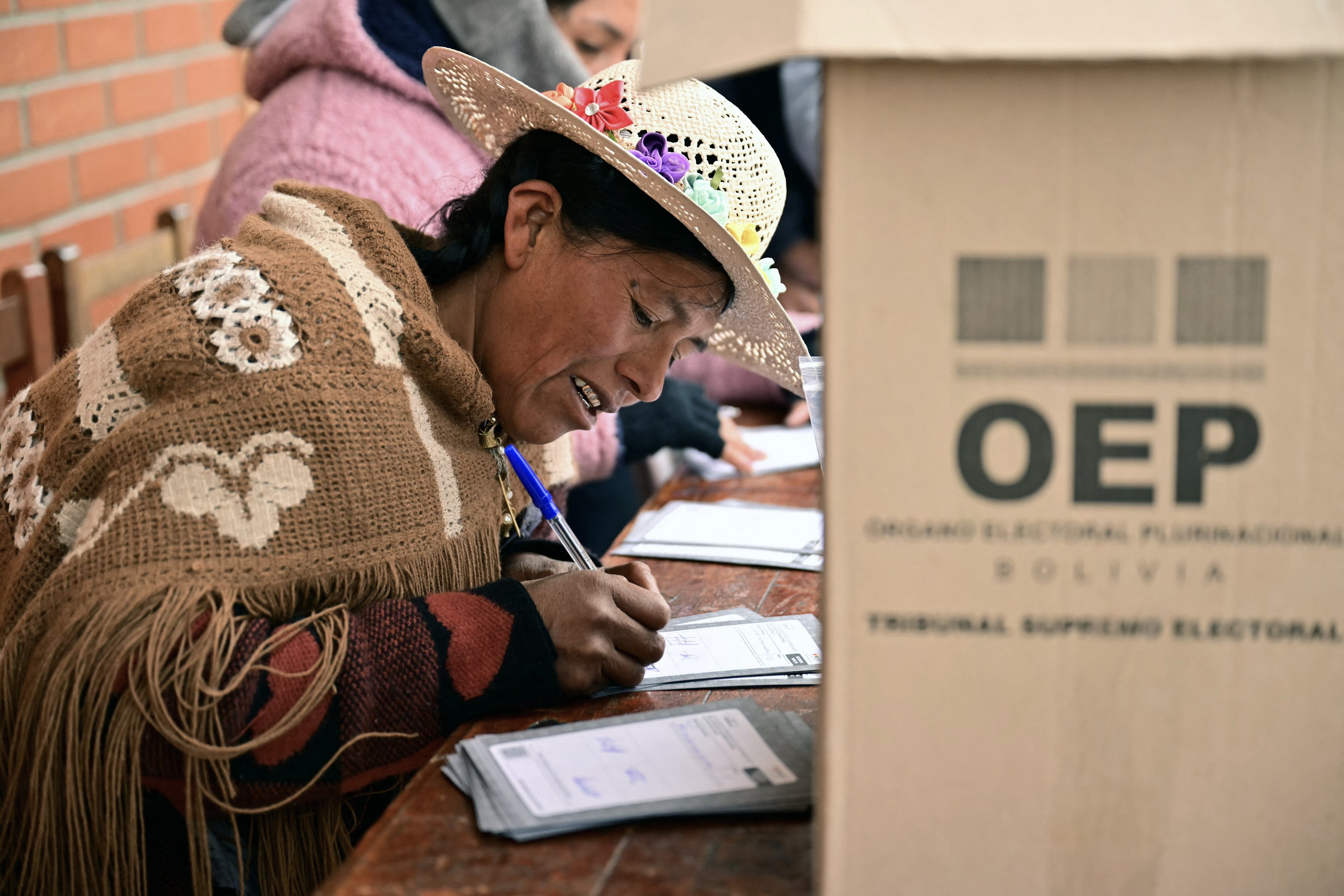 Bolivians head to the polls to choose between right-wing candidates Jorge 'Tuto' Quiroga and Senator Rodrigo Paz (MARTIN BERNETTI / AFP)