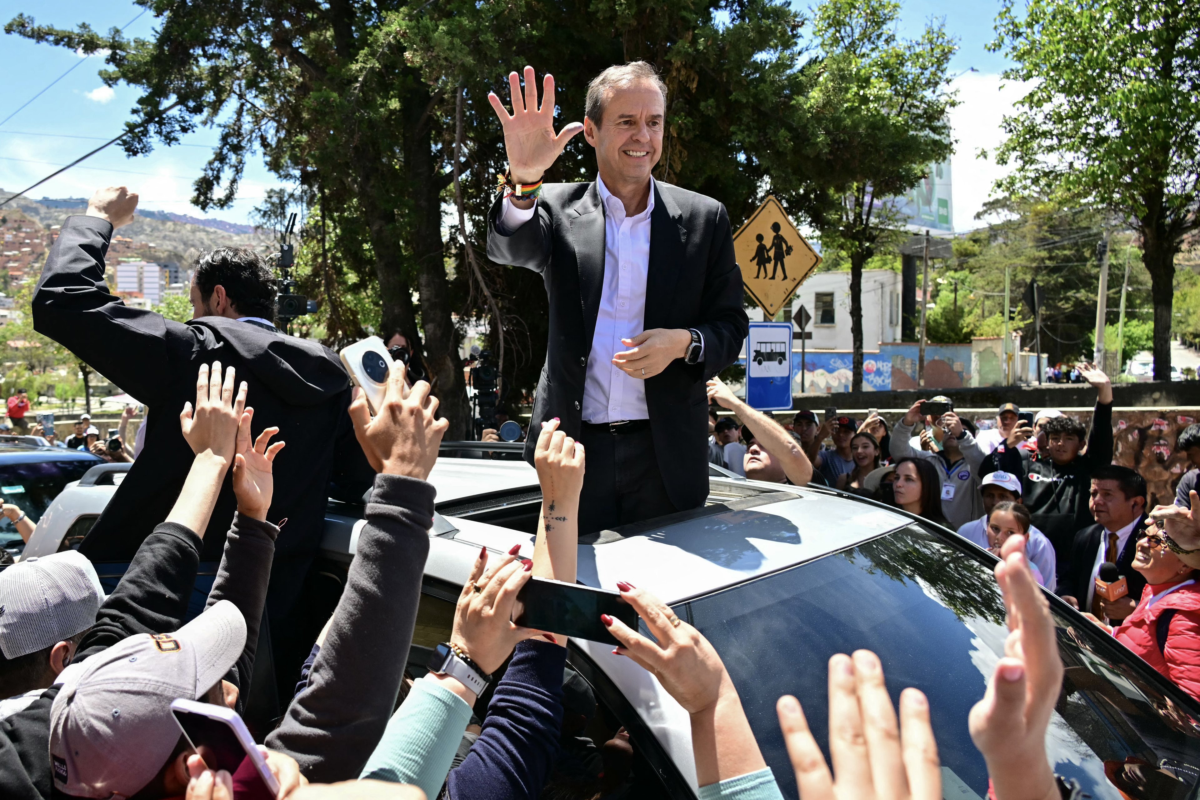 No domingo, 19, Quiroga interagiu com apoiadores e eleitores (AFP).
