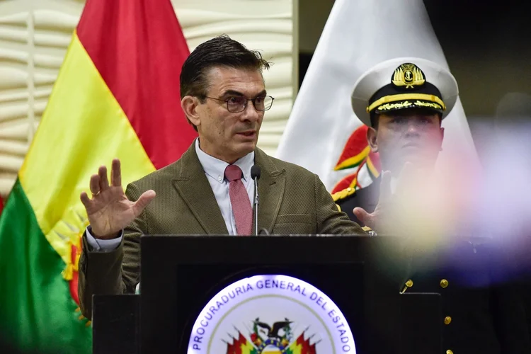 Bolivia's President Rodrigo Paz speaks during a press conference to announce the creation of a truth commission to investigate corruption in the hydrocarbon sector, at the Attorney General's Office in El Alto on December 15, 2025. (Photo by Jorge BERNAL / AFP)