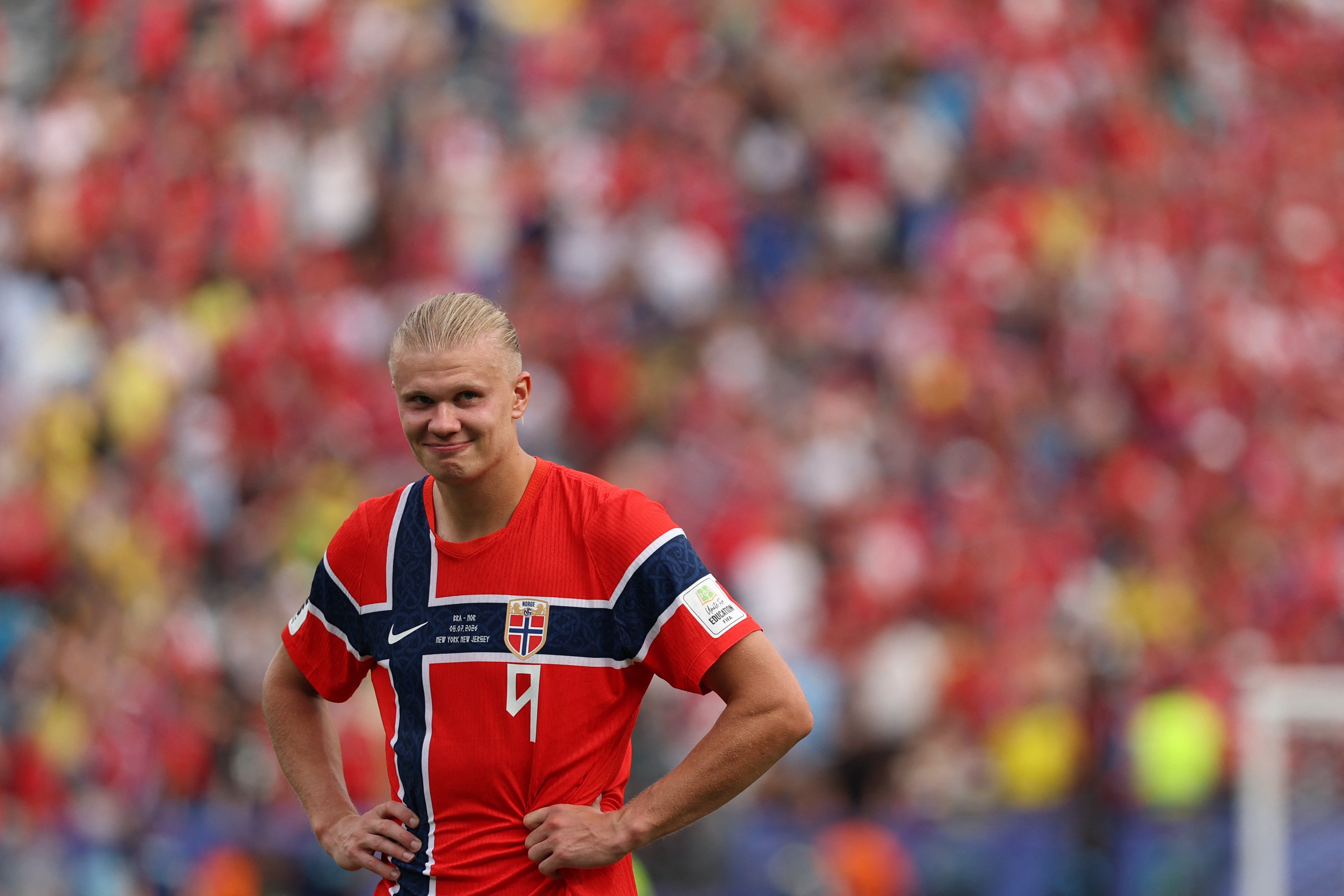 O atacante norueguês número 9, Erling Braut Haaland, sorri após a vitória do Brasil sobre a Noruega nas oitavas de final da Copa do Mundo de 2026, no Estádio Nova York/Nova Jersey, em East Rutherford, em 5 de julho de 2026. (Foto de Odd ANDERSEN / AFP)